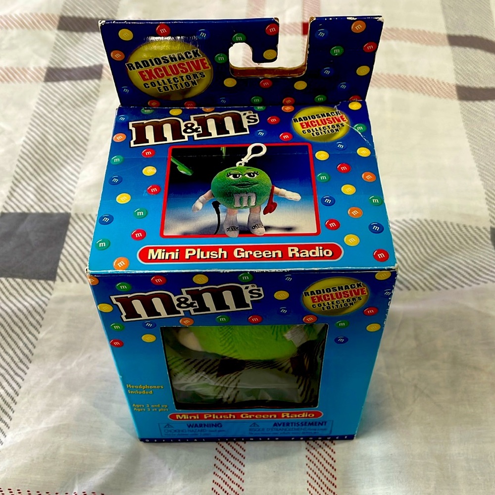 Vintage new in box M&M’s green personal FM radio with headset.